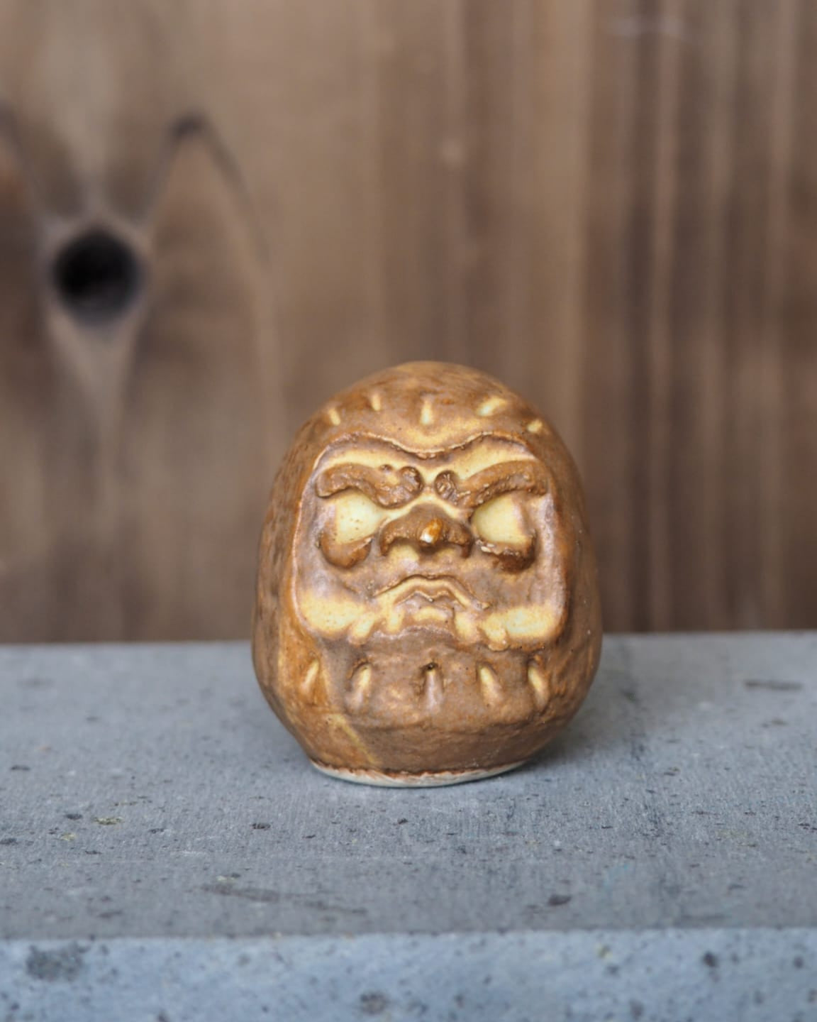 Daruma em grés