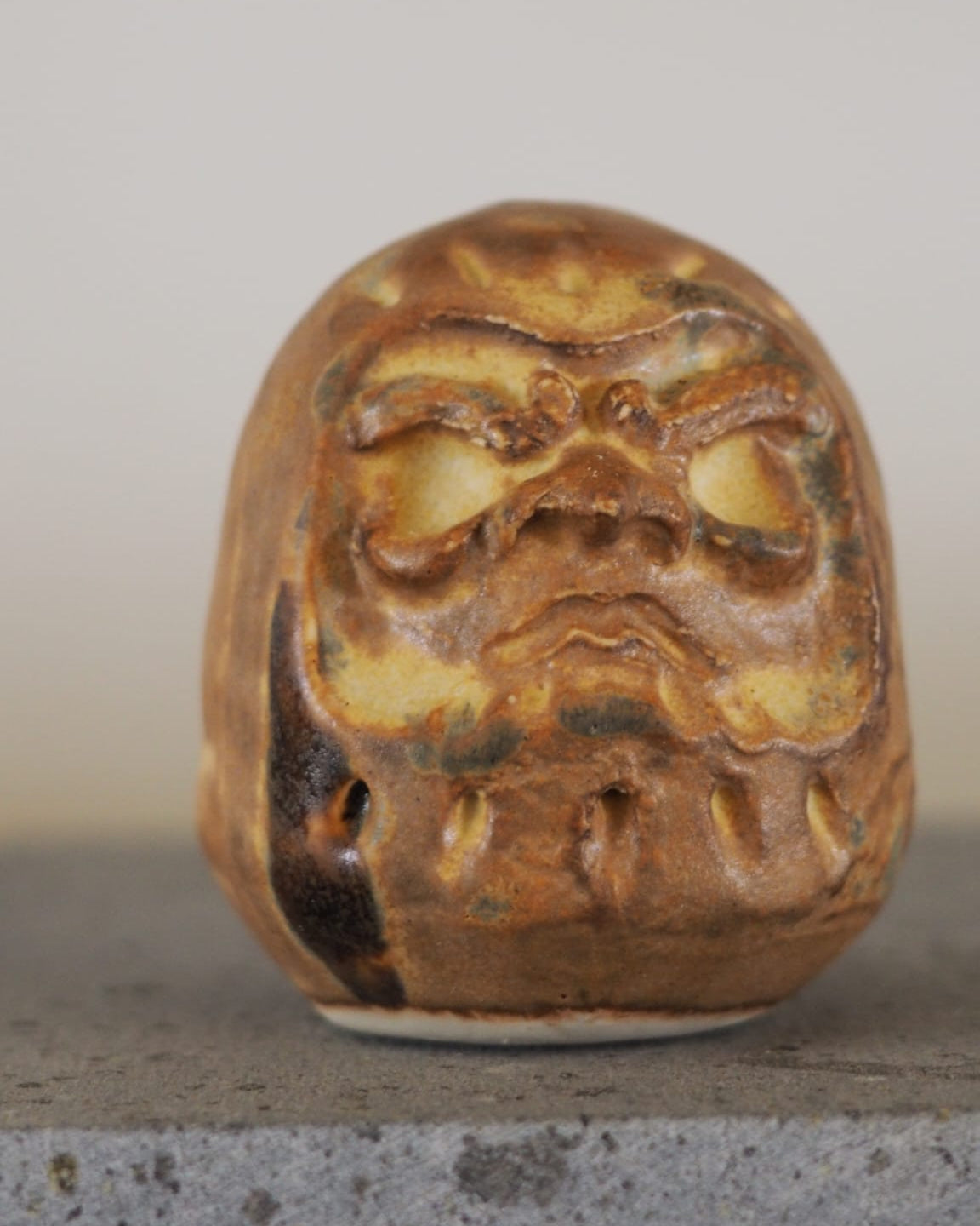 Daruma em grés